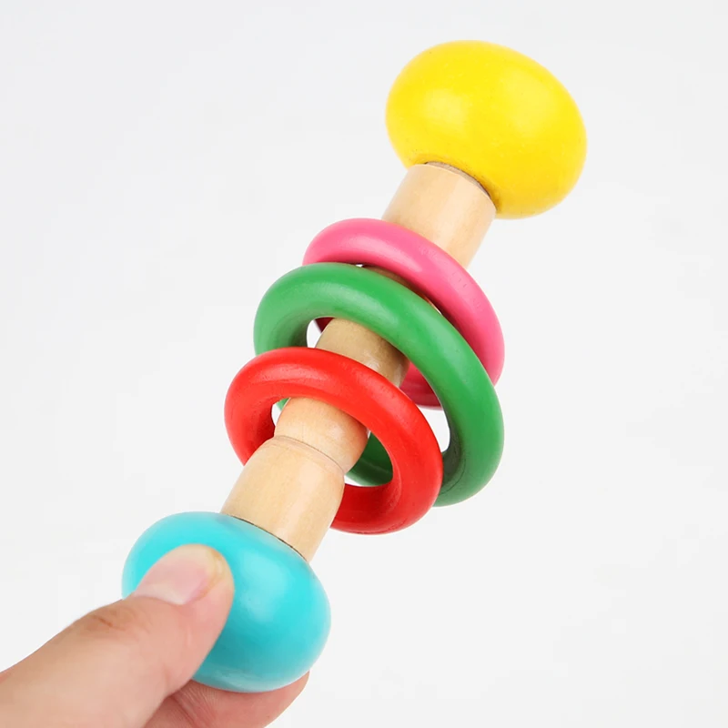 1pc-Baby-Toys-Beech-Wooden-Rattle-Hand-Bells-Toys-Of-Newbron-Montessori-Educational-Toys-Mobile-Rattle-1.webp
