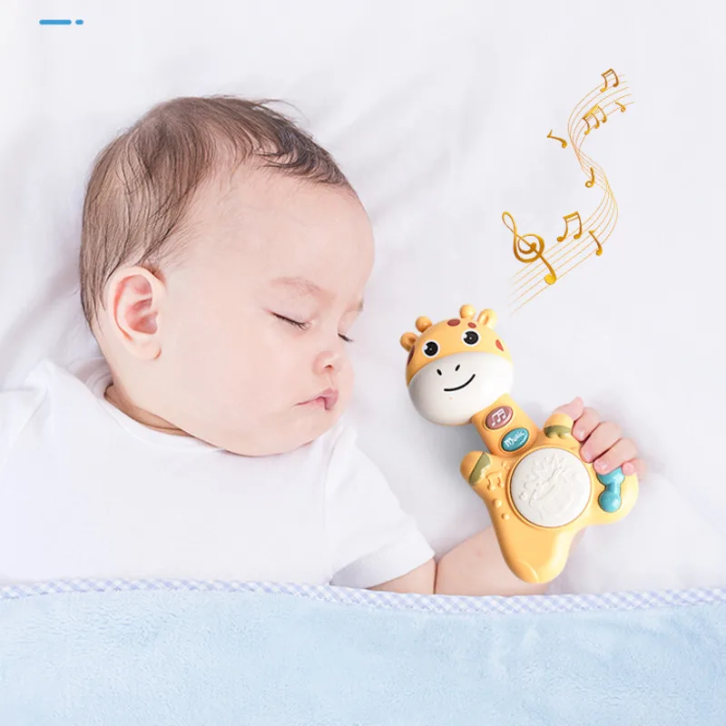 Musical-Flashing-Baby-Rattle-Cartoon-Deer-Hand-Drum-Early-Learning-Education-Toys-Infant-Hand-Bell-Mobile-1.webp